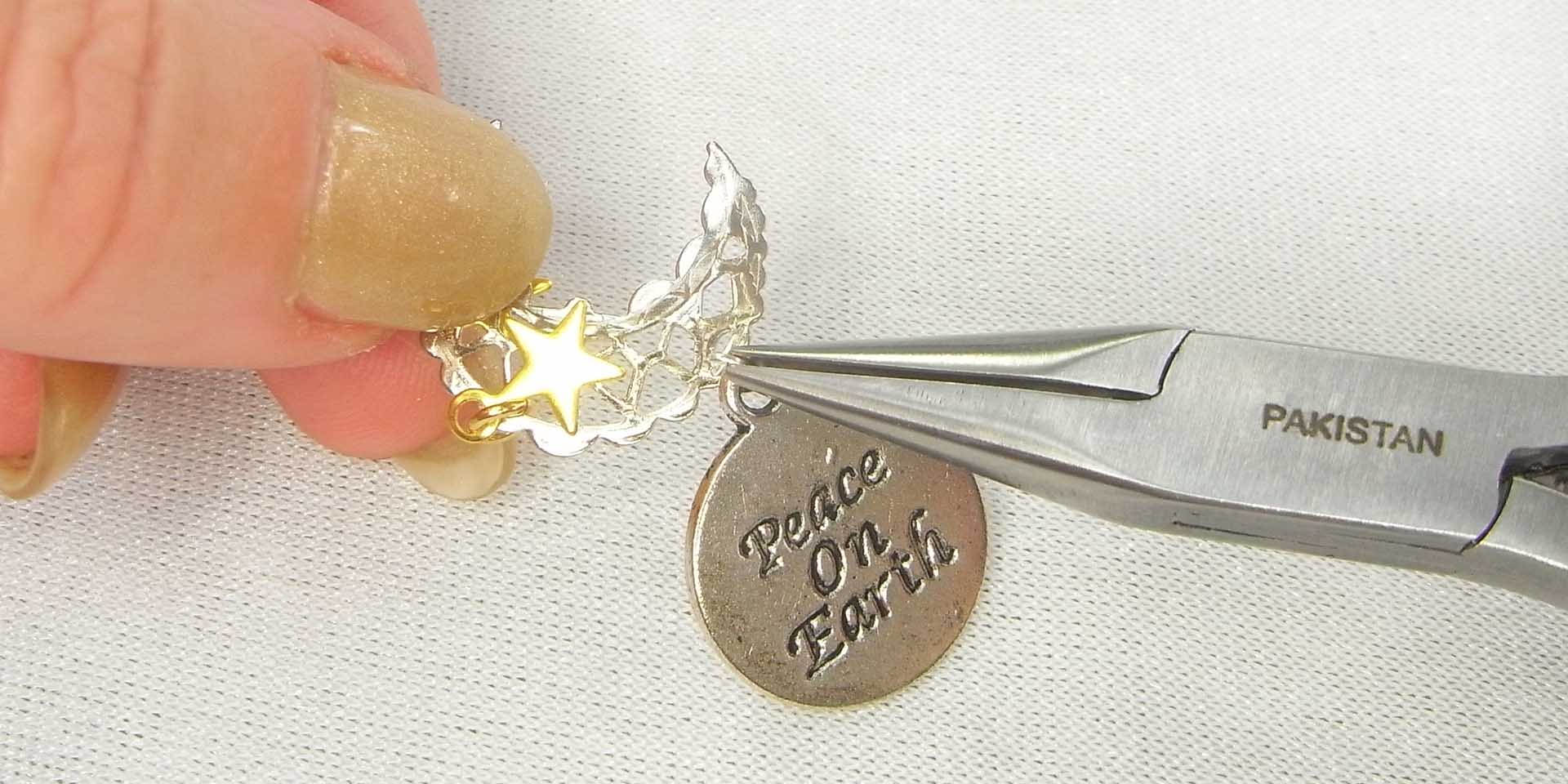 attaching the filigree to the Christmas tree bead