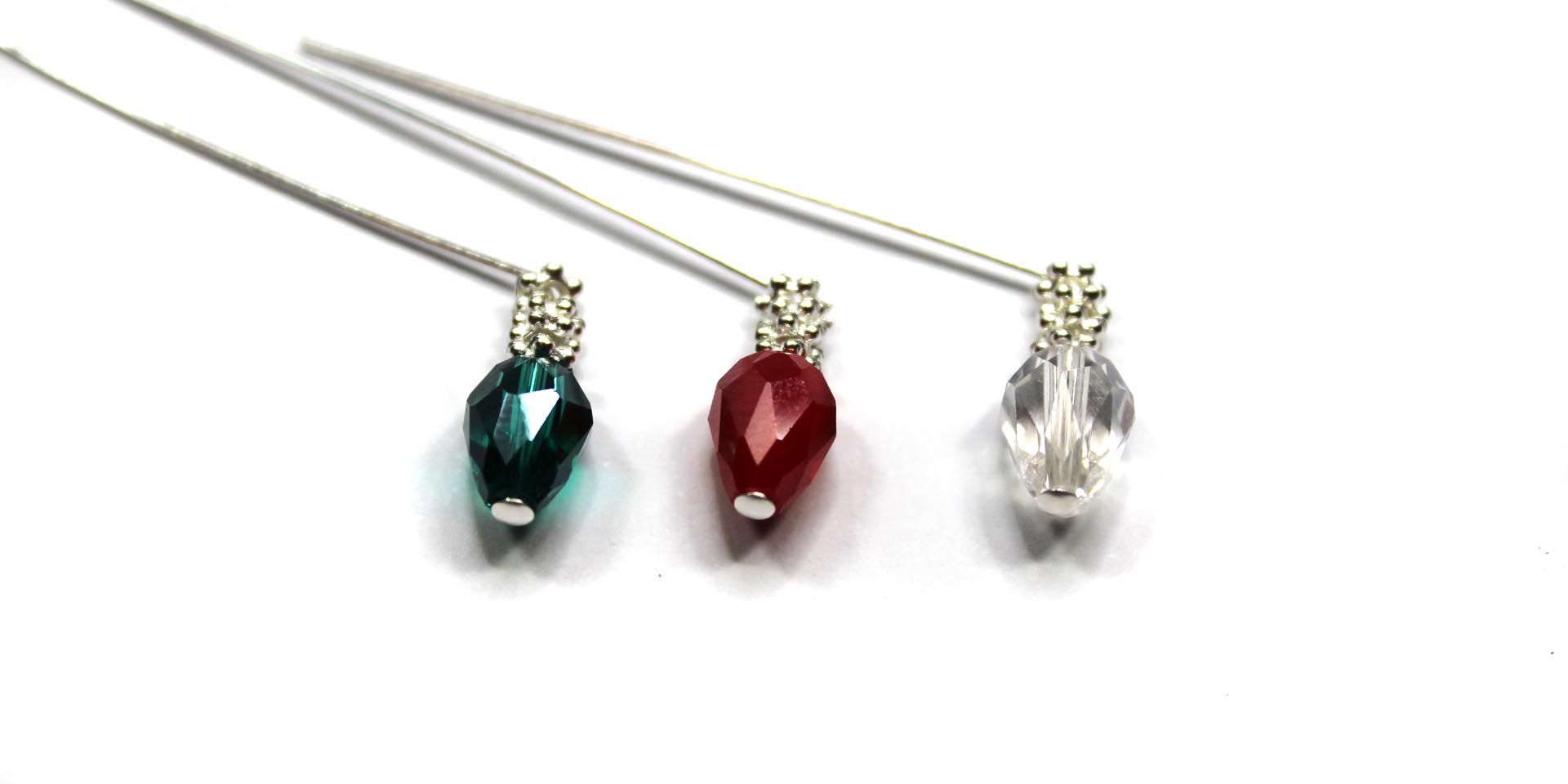 bend headpins sideways above the daisy spacers