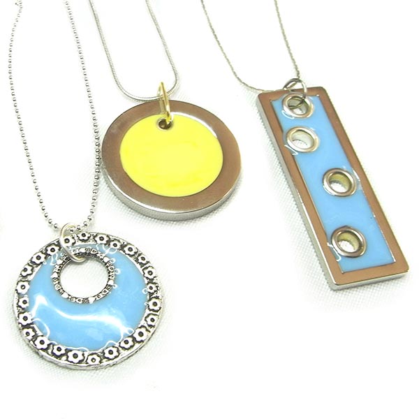 Three pastel coloured resin pendants