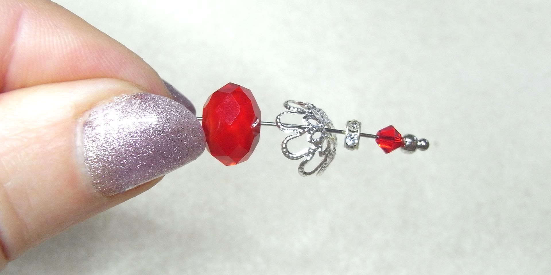 String the beads and findings on the ball headpin String the beads and findings on the ball headpin