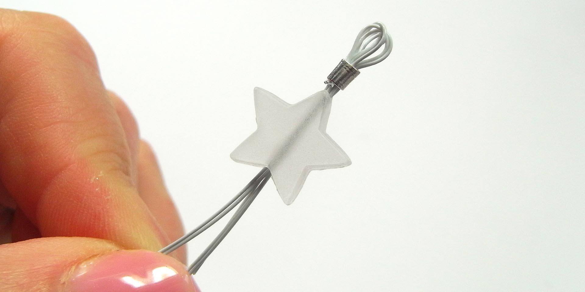 string star bead on tiger tail string star bead on tiger tail