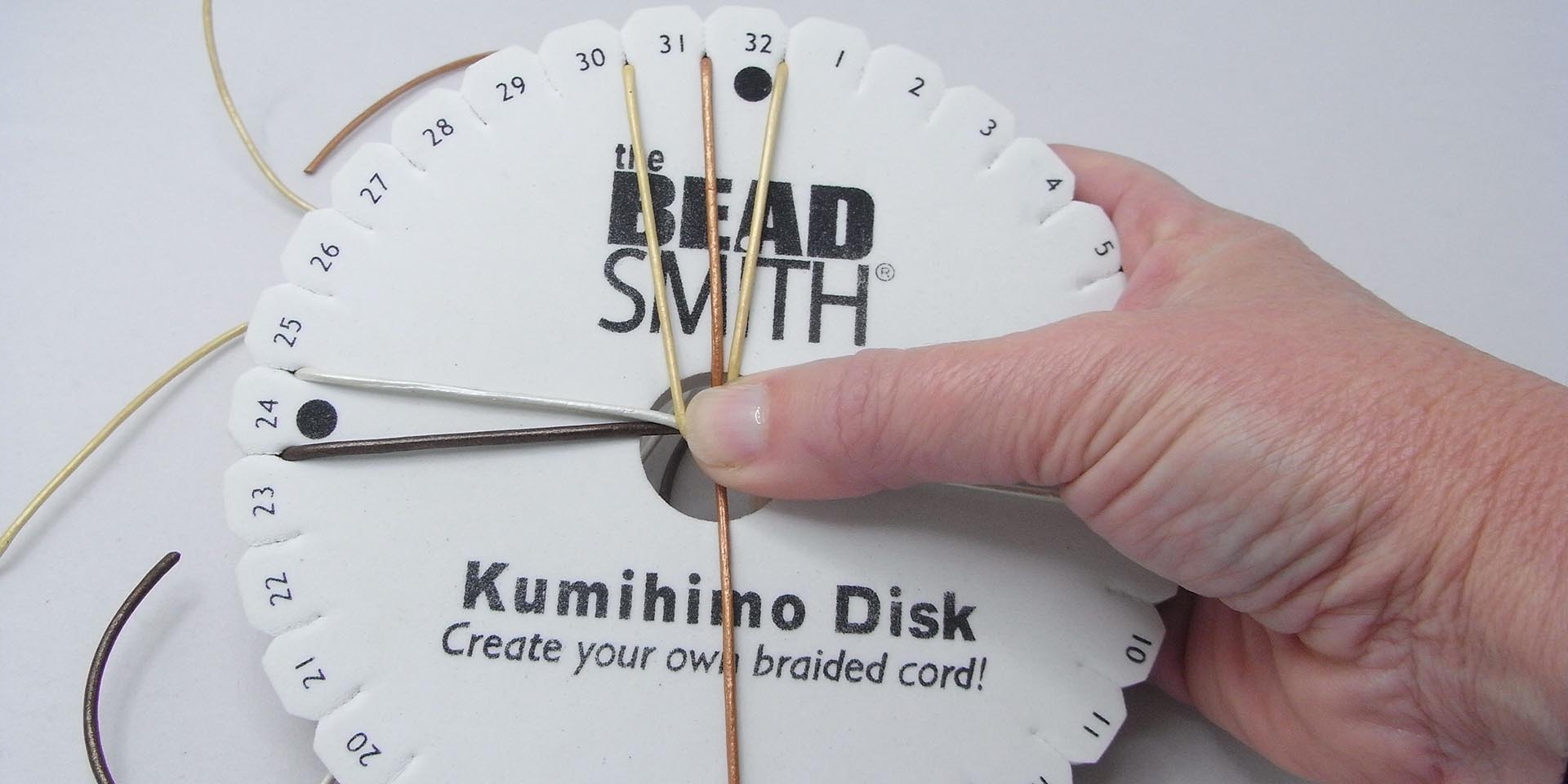braid the leather cord on a Kumihimo disk
