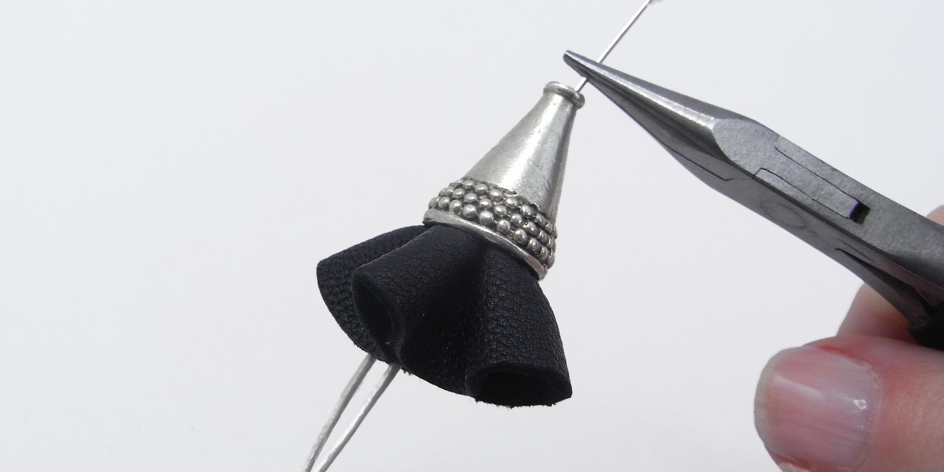 pull leather through the bead cone