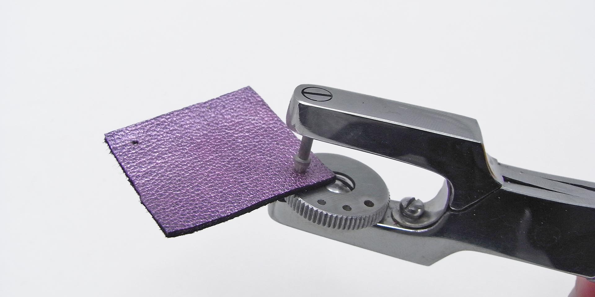 use a hole to punch holes in the leather square use a hole to punch holes in the leather square